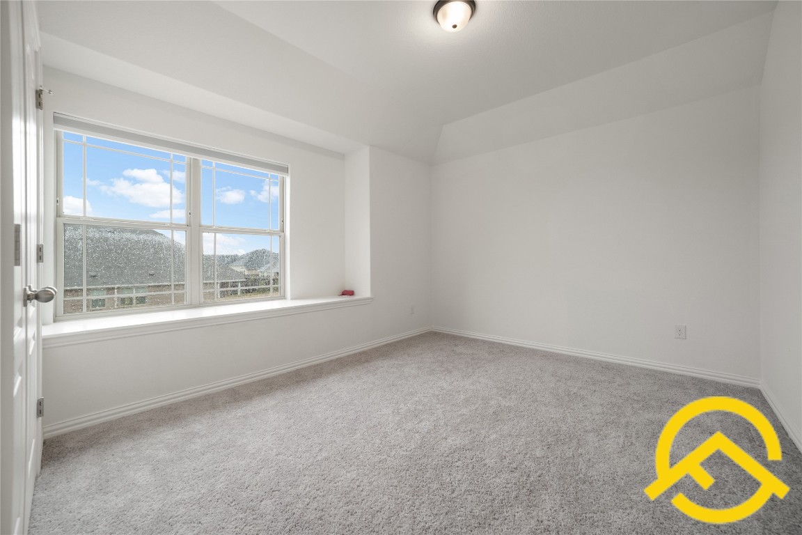 671 Durian Loop Buda, TX 78610 - Photo 16 of 29 an empty room with window