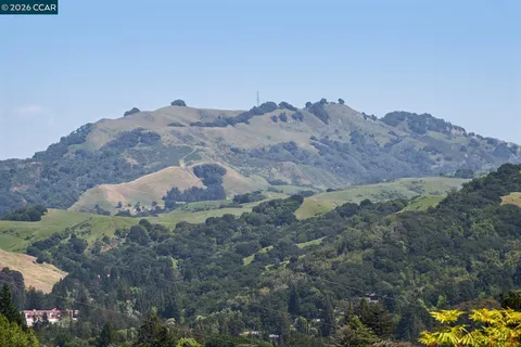 a view of mountains and valleys
