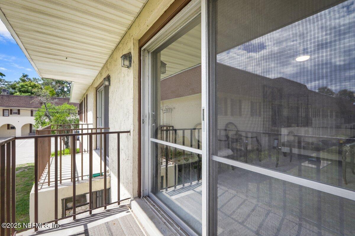 7346 El Barco Road, Unit 7 Jacksonville, FL 32216 - Photo 4 of 6 a view of a balcony