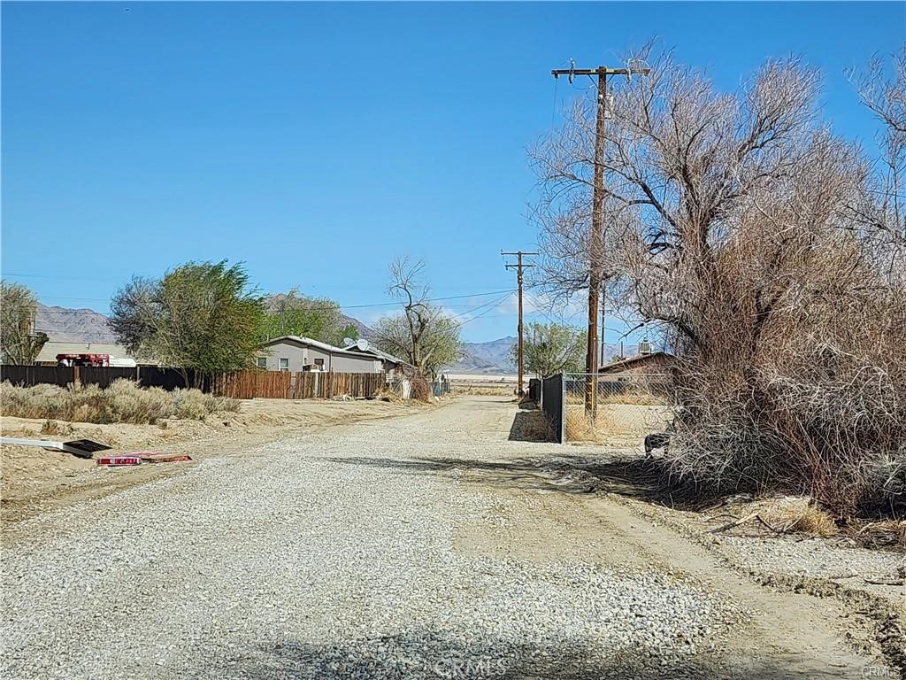 401 Ox Bow Road Lucerne Valley, CA 92356 - Photo 2 of 2 a row of houses with a outdoor space