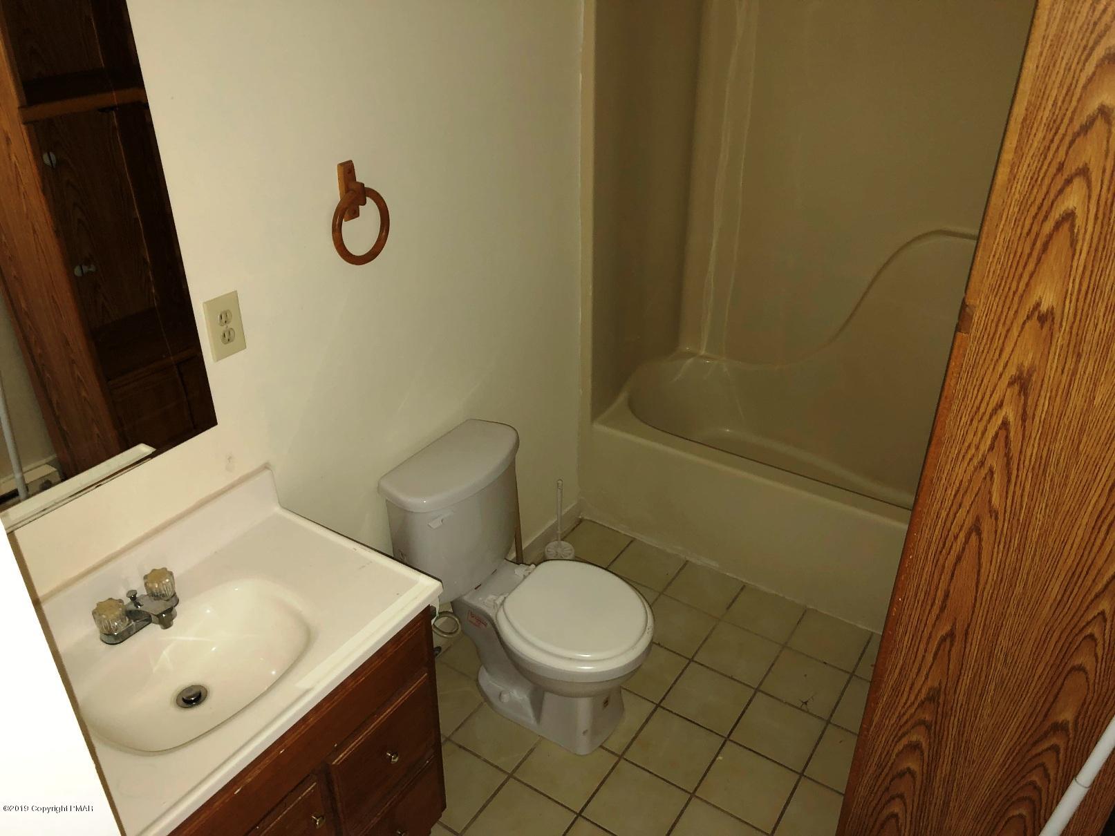 327 Crewe Court Bushkill, PA 18324 - Photo 6 of 10 a bathroom with a sink and a toilet