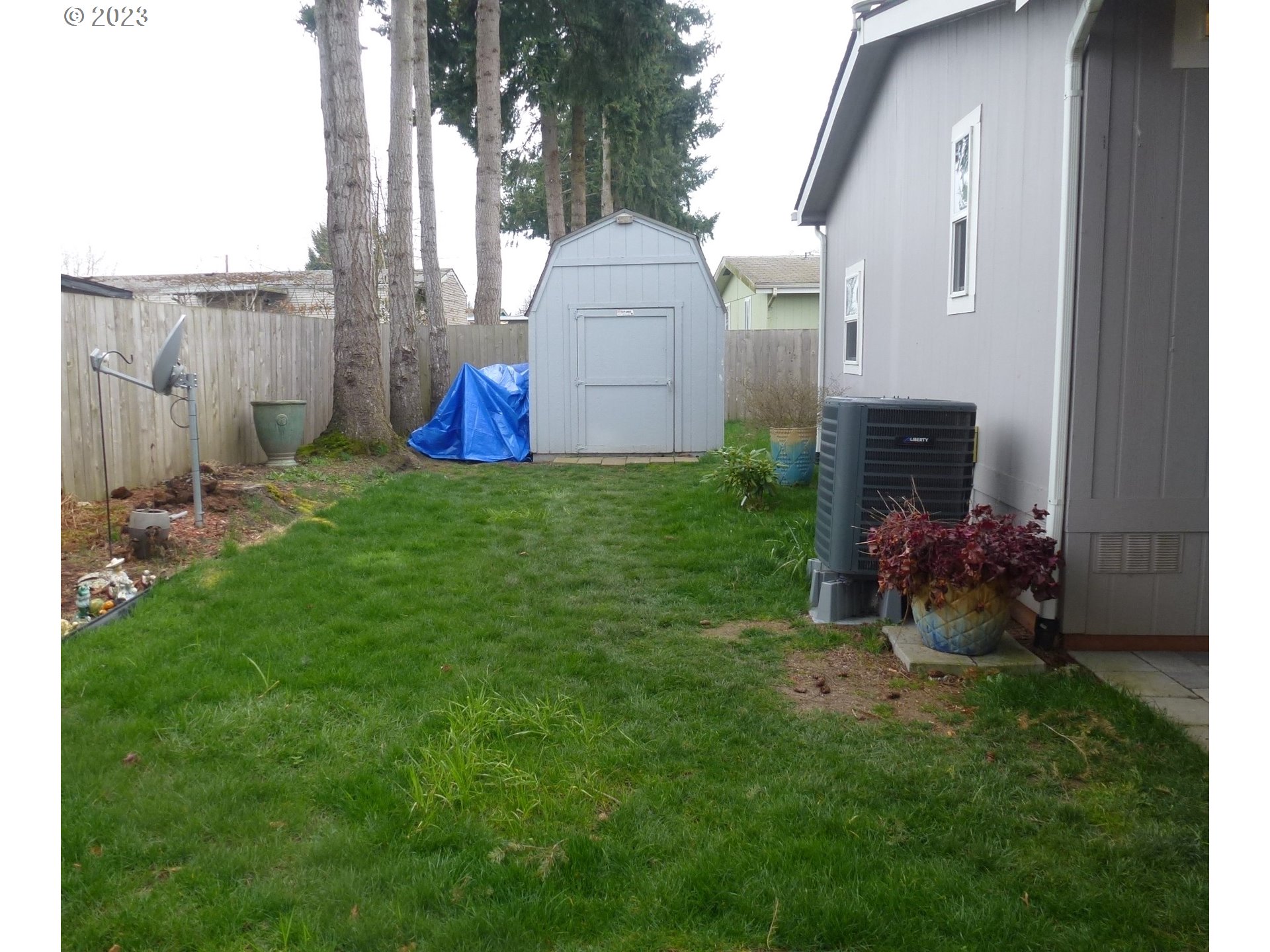 151 Edwards Road South, Unit 87 Monmouth, OR 97361 - Photo 17 of 18 a front view of a house with garden