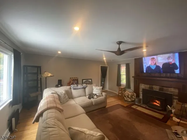 a kitchen with stainless steel appliances a refrigerator and a counter