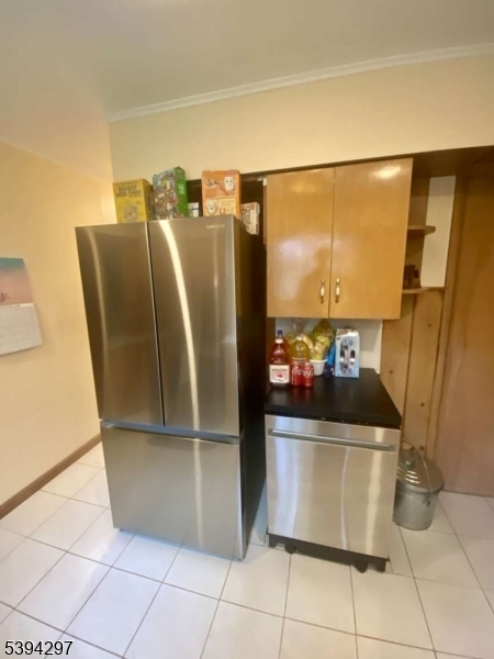 7 Stempert Road Branchville, NJ 07826 - Photo 35 of 50 a view of a refrigerator in kitchen and an empty room
