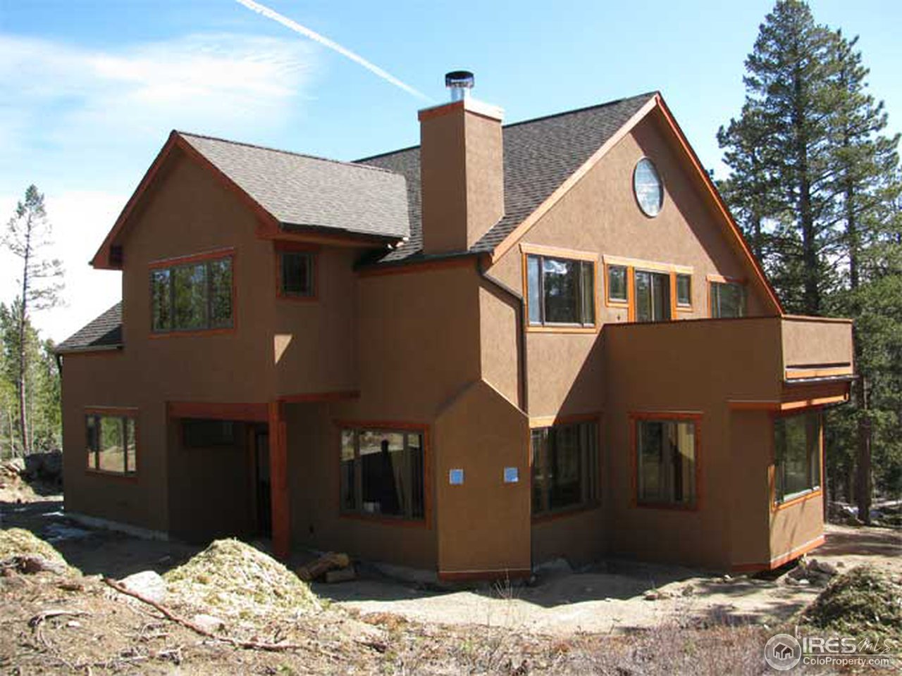 2607 Ridge Road Nederland, CO 80466 - Photo 15 of 18 a front view of a house with a yard