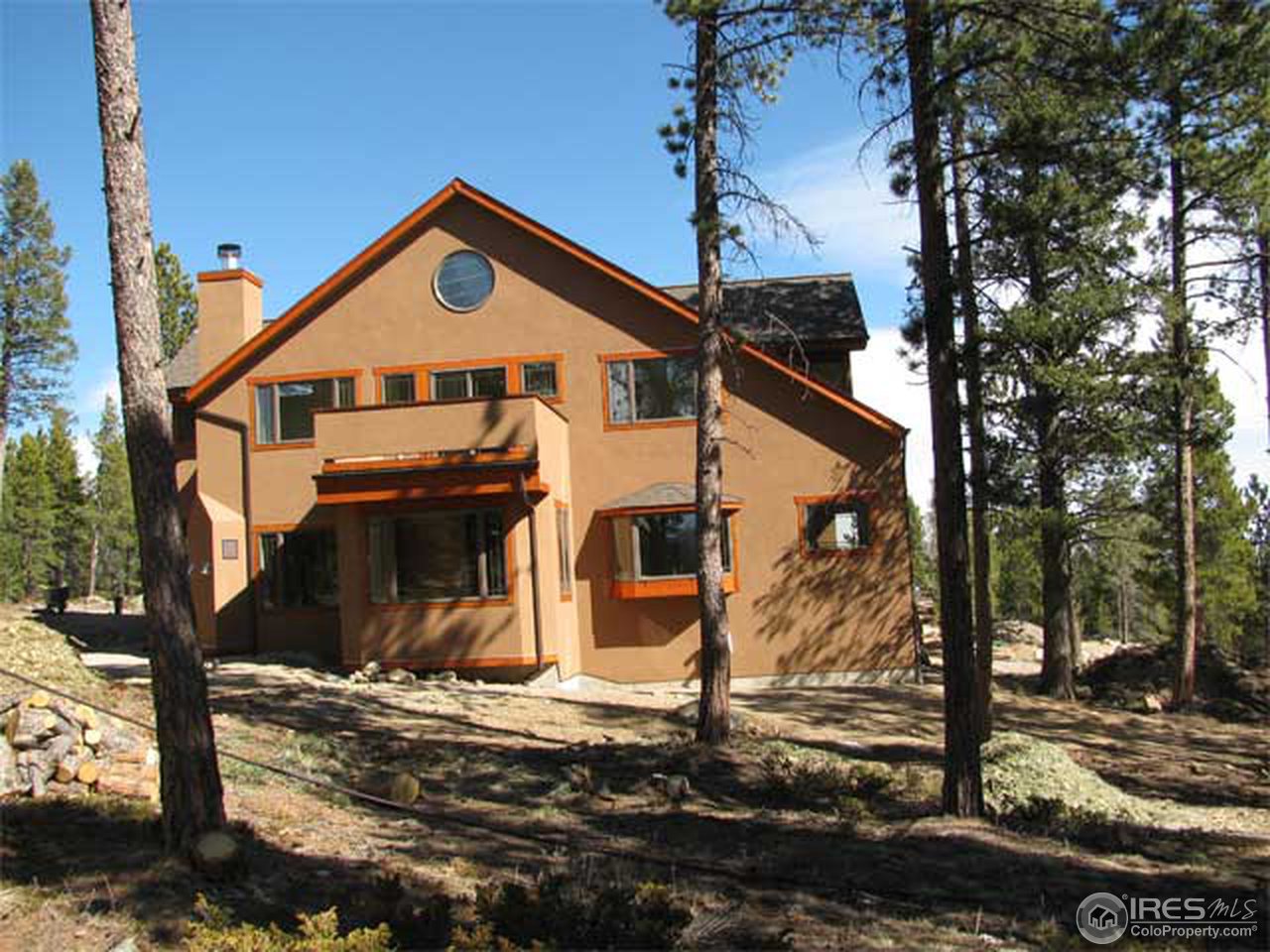2607 Ridge Road Nederland, CO 80466 - Photo 17 of 18 a view of a house with a yard