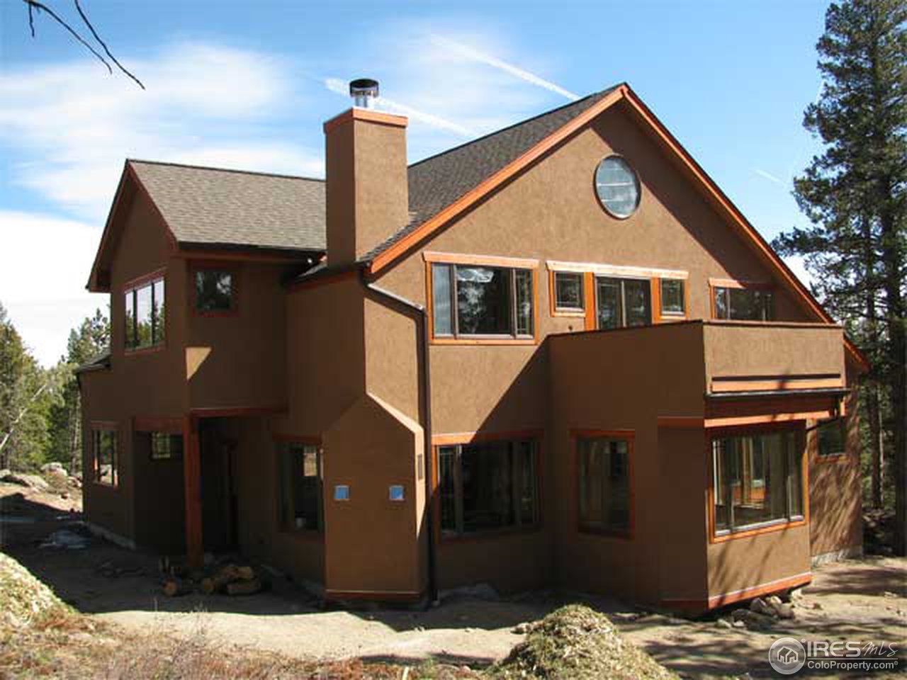 2607 Ridge Road Nederland, CO 80466 - Photo 2 of 18 a view of a house with a yard
