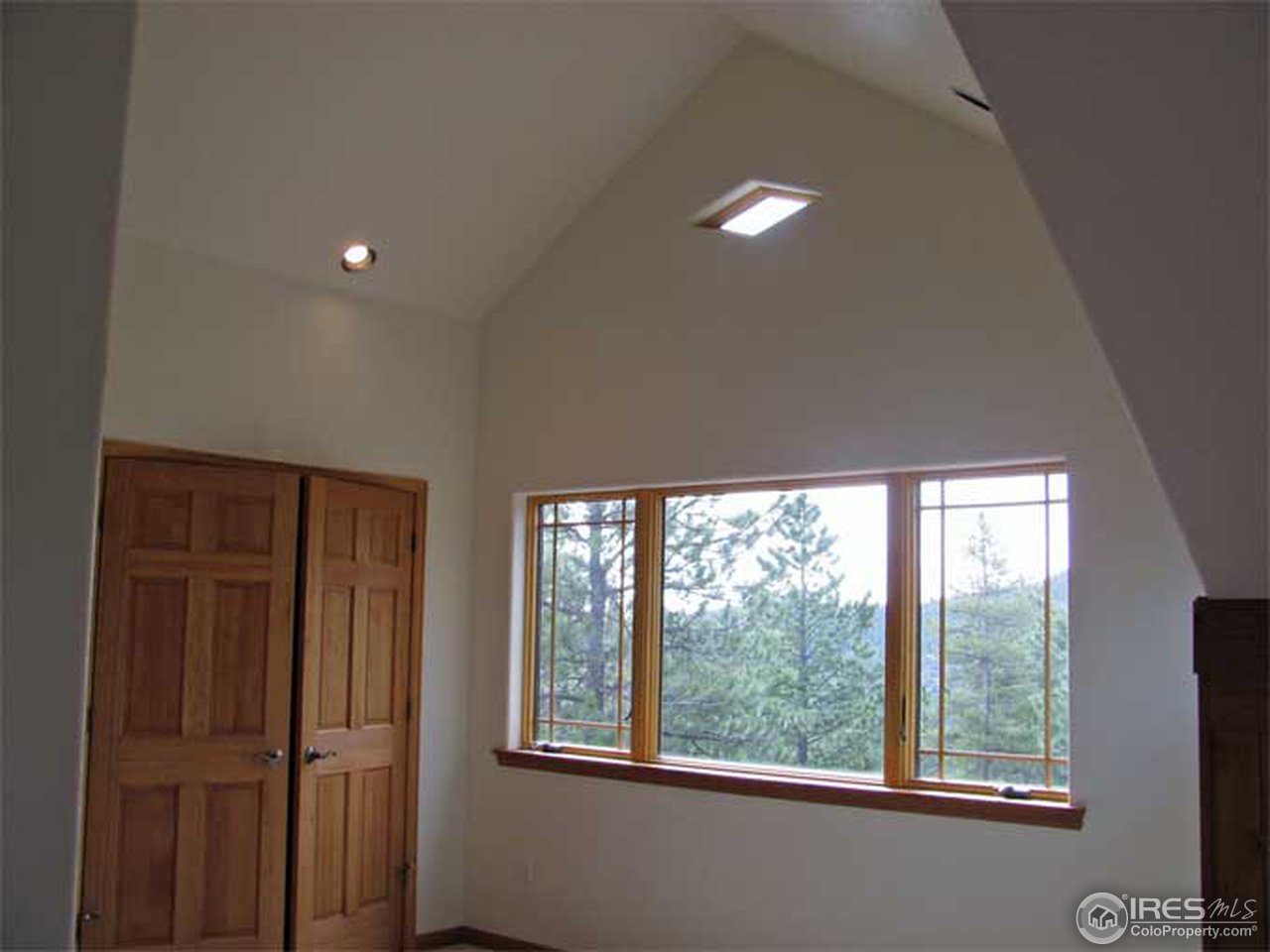 2607 Ridge Road Nederland, CO 80466 - Photo 8 of 18 a view of empty room with a window