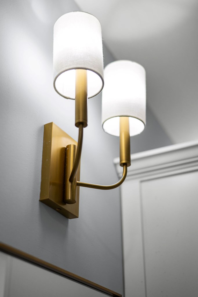1201 Front Avenue, Unit 322 Columbus, GA 31901 - Photo 19 of 54 a lamp on a table and a mirror