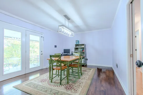 a workspace with furniture and window