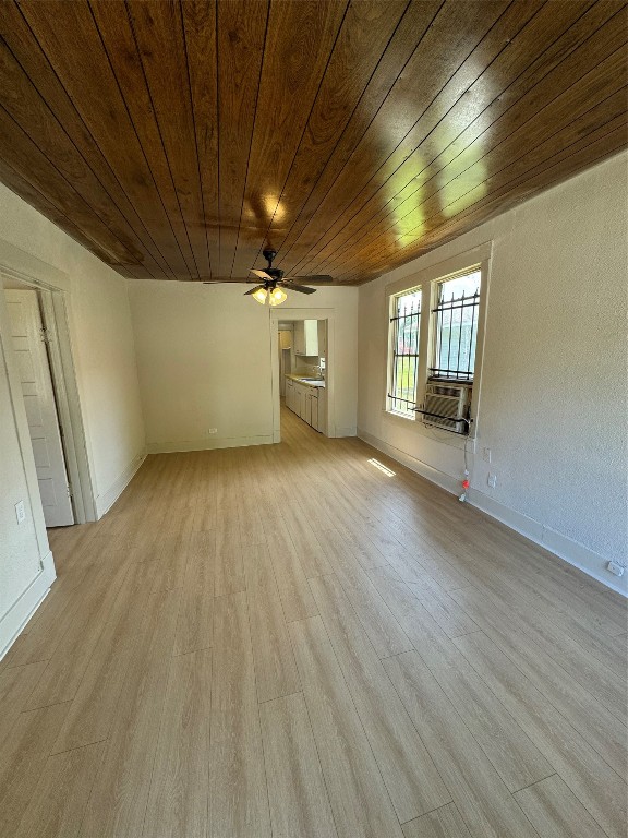 3428 Reeves Street Houston, TX 77004 - Photo 8 of 10 a view of an empty room with wooden floor and a window