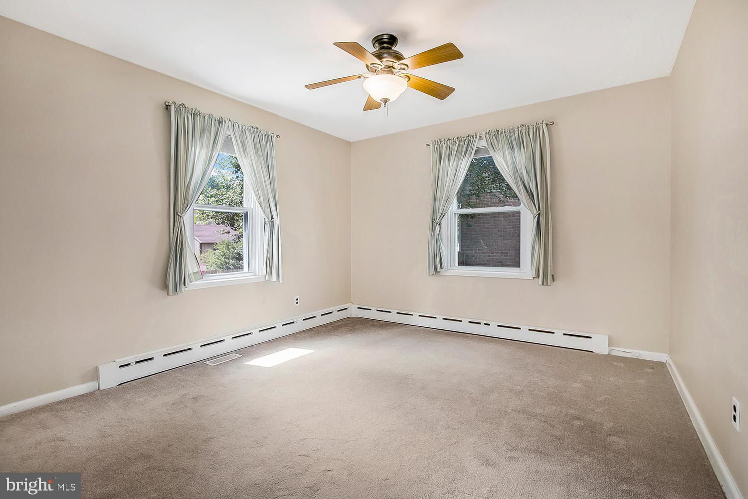 106 Devonshire Road Wilmington, DE 19803 - Photo 11 of 26 Main level BD - w/ carpeting, double closet & fan