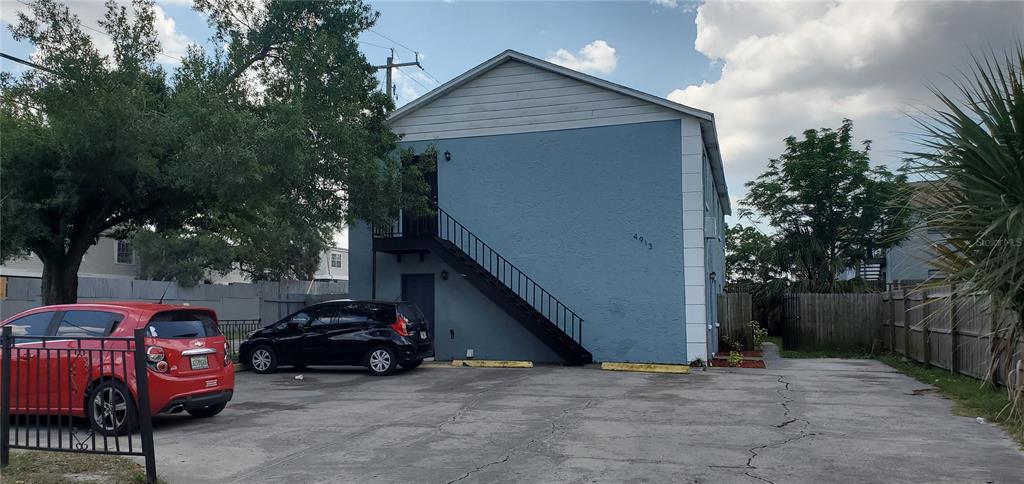 4913 East Temple Heights Road, Unit AD Tampa, FL 33617 - Photo 1 of 1 a view of a car garage
