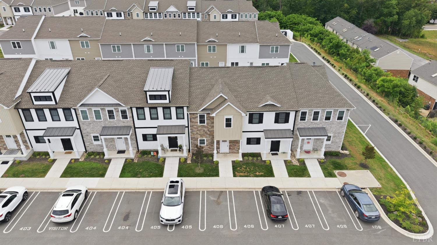 556 Leesville Road, Unit 406 Lynchburg, VA 24502 - Photo 38 of 39 an aerial view of residential houses with yard