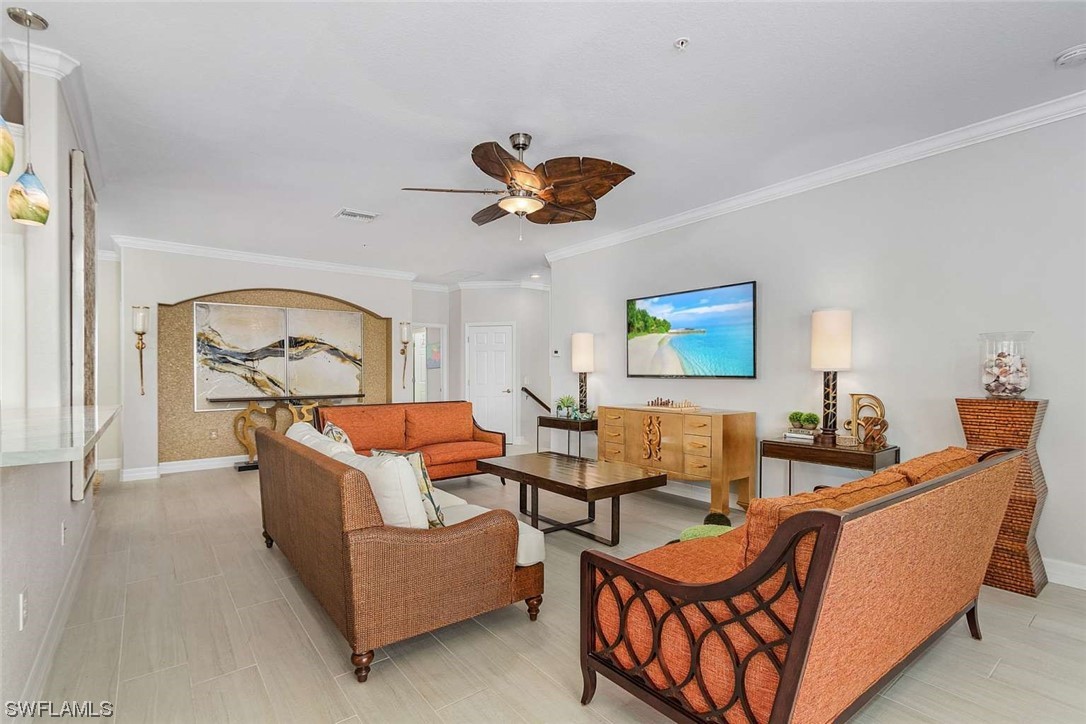 9490 Napoli Lane, Unit 202 Naples, FL 34113 - Photo 15 of 24 a living room with furniture