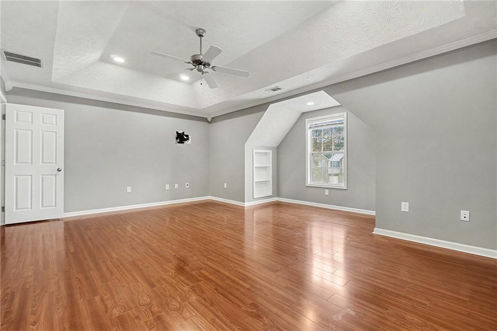 307 Remington Pl Boulevard Dallas, GA 30157 - Photo 15 of 27 a view of an empty room with wooden floor and a window