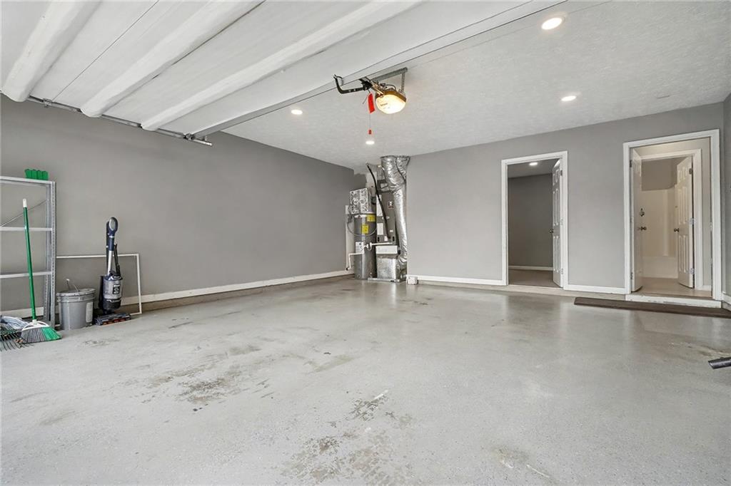 307 Remington Pl Boulevard Dallas, GA 30157 - Photo 23 of 27 an empty room with ceiling fan and window