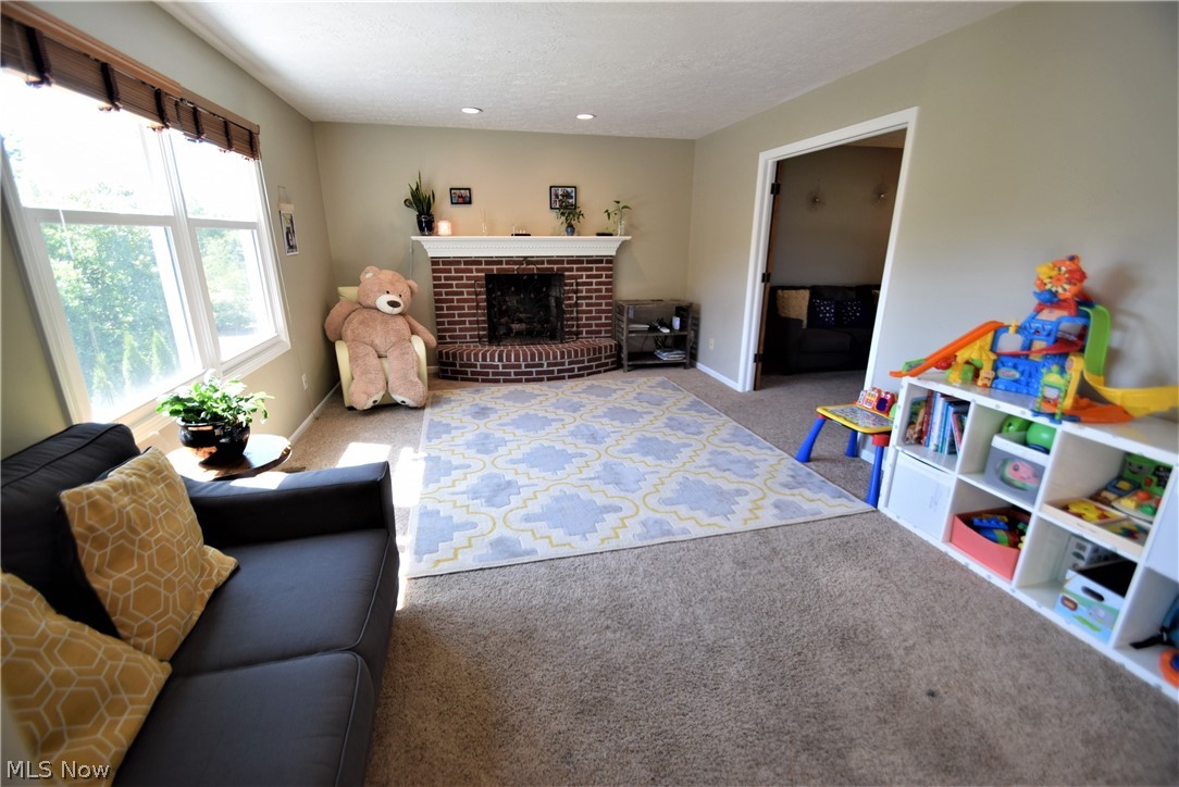 6184 Rockside Circle Northwest Canton, OH 44718 - Photo 4 of 31 Family Room *Gas Fireplace *Opens to Living Room