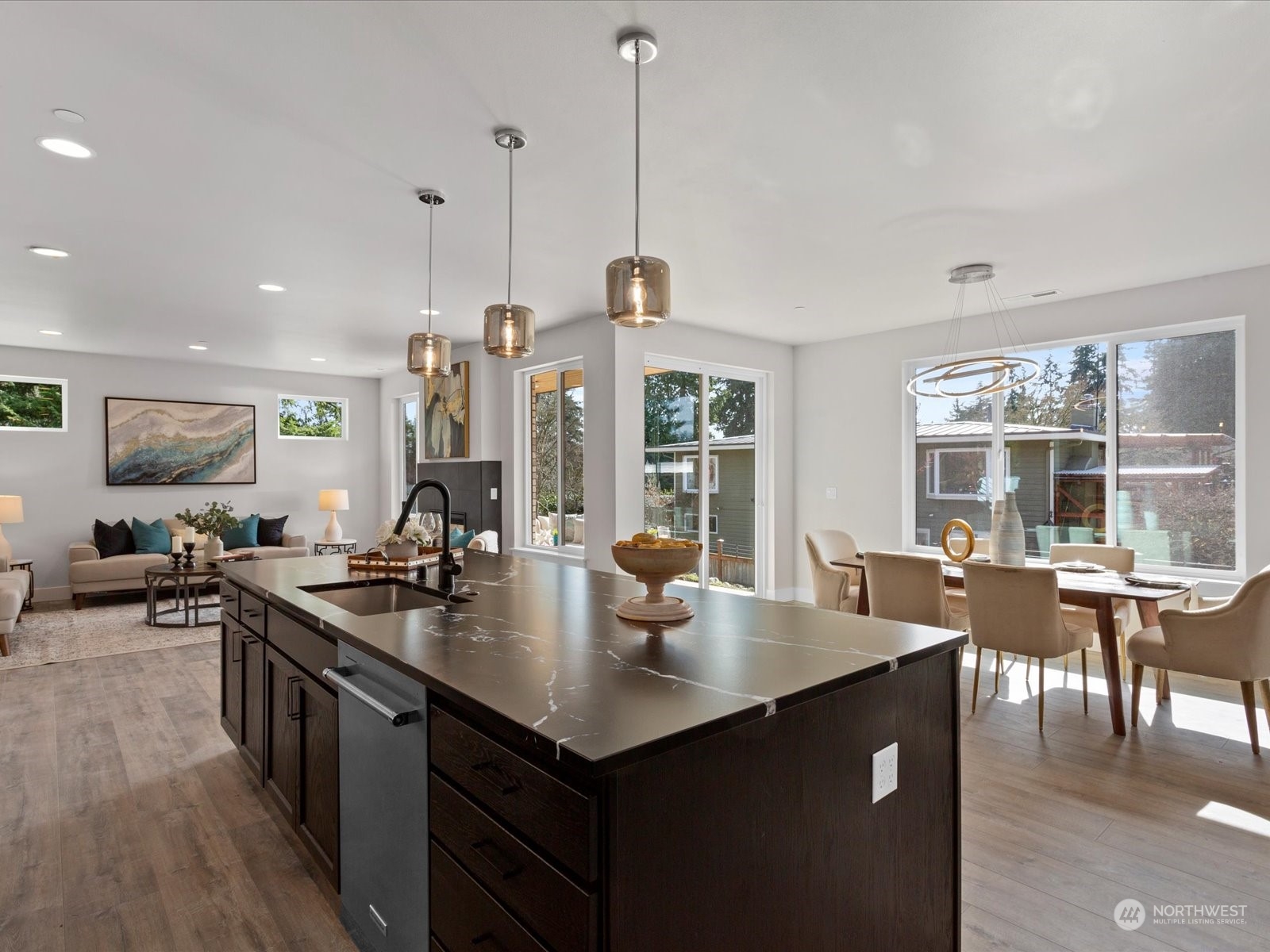 21609 1st Avenue West Bothell, WA 98021 - Photo 14 of 40 a kitchen with counter space sink stove and wooden floor
