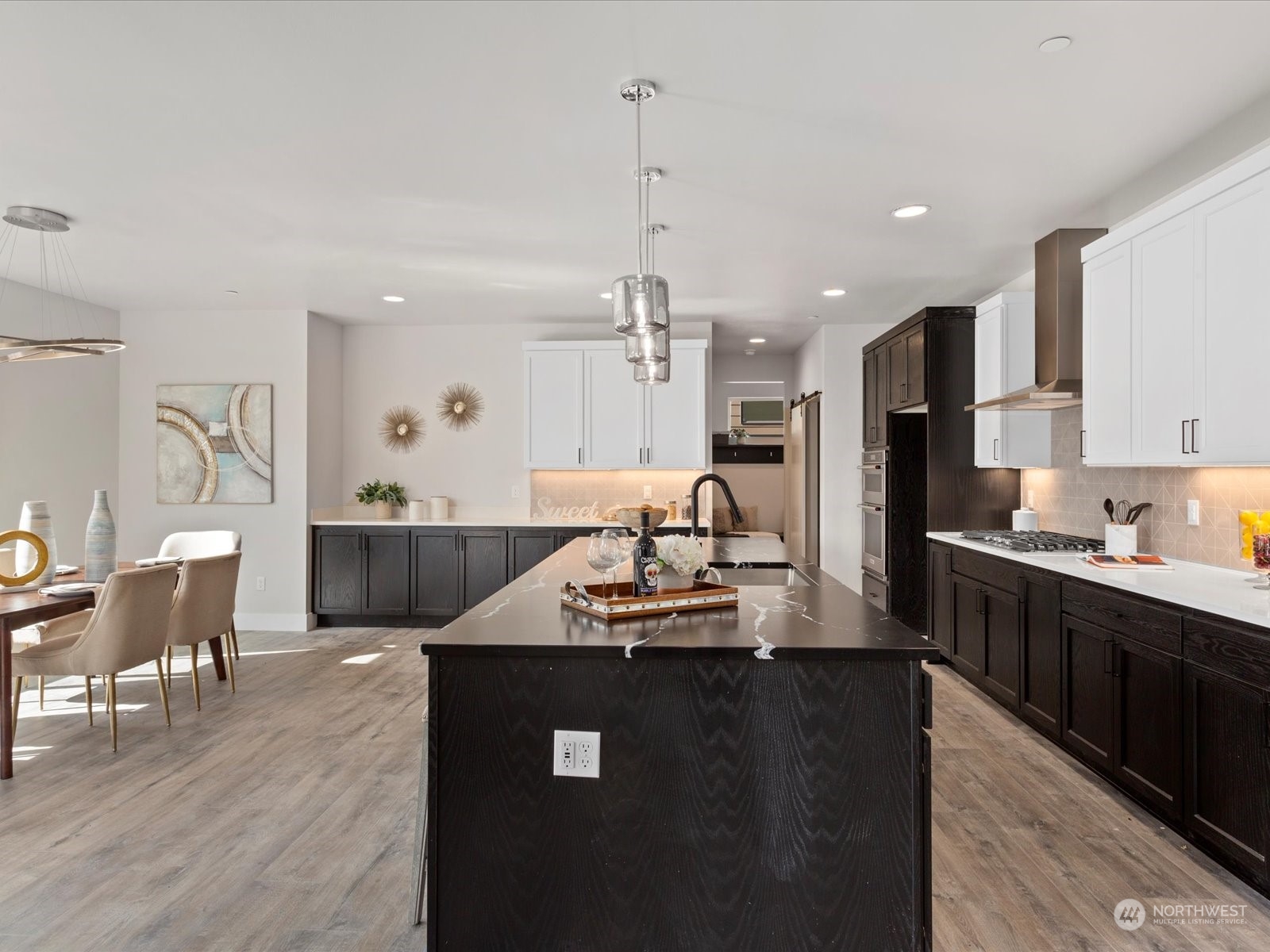 21609 1st Avenue West Bothell, WA 98021 - Photo 16 of 40 a kitchen with kitchen island granite countertop a sink counter top space and stainless steel appliances
