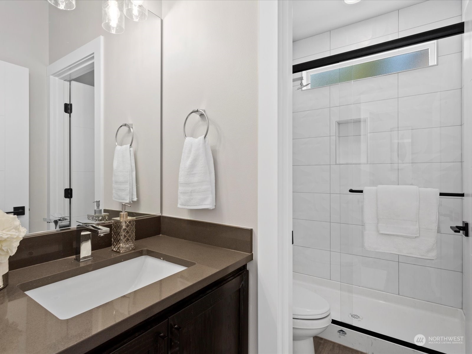 21609 1st Avenue West Bothell, WA 98021 - Photo 17 of 40 a bathroom with a sink and a mirror