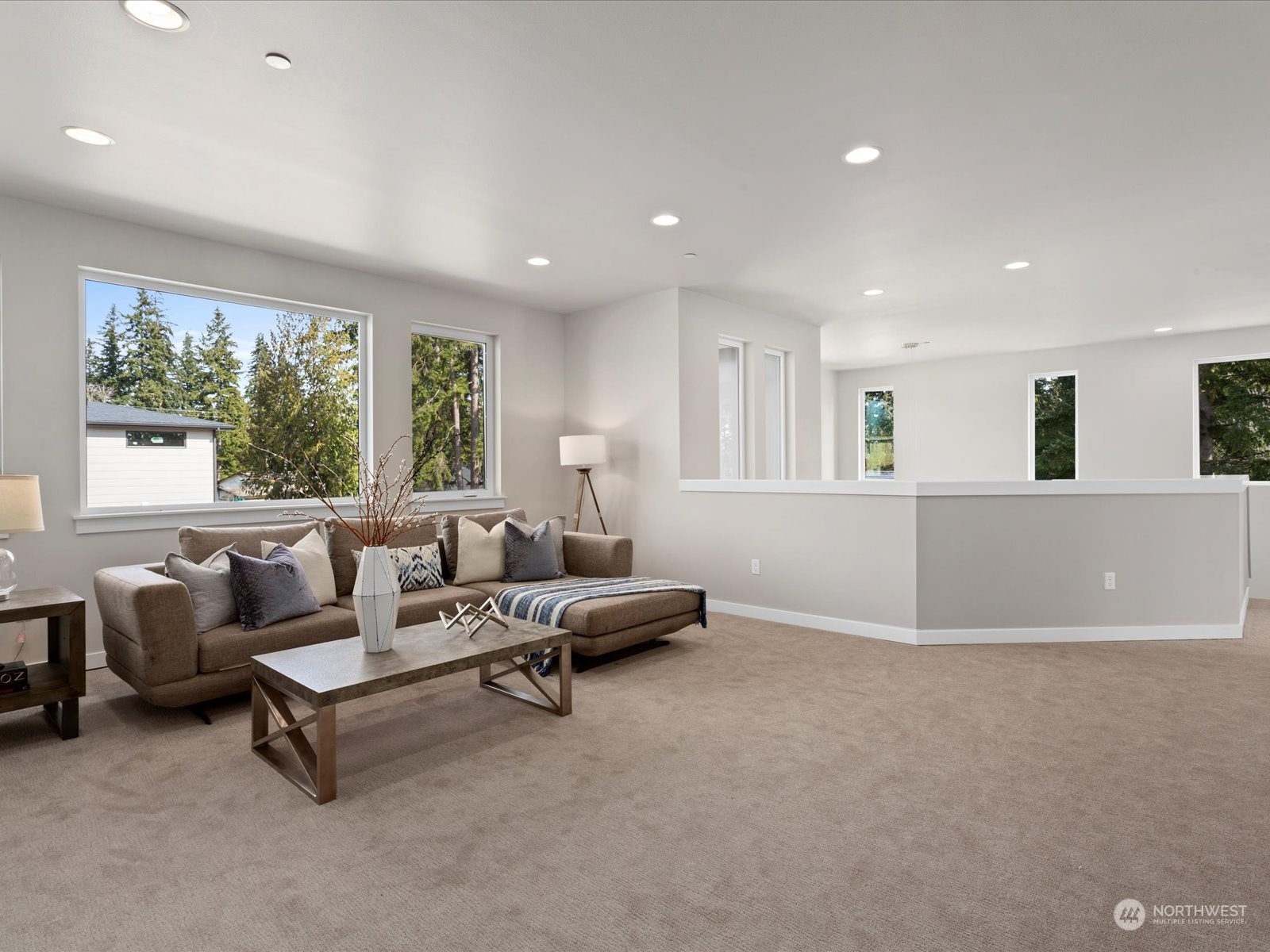 21609 1st Avenue West Bothell, WA 98021 - Photo 21 of 40 a living room with furniture and a large window