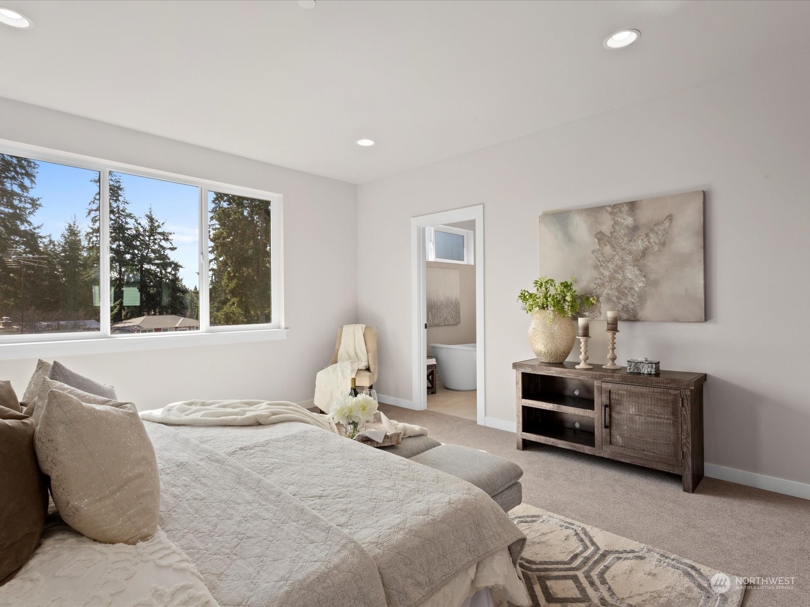 21609 1st Avenue West Bothell, WA 98021 - Photo 26 of 40 a bedroom with a bed and window