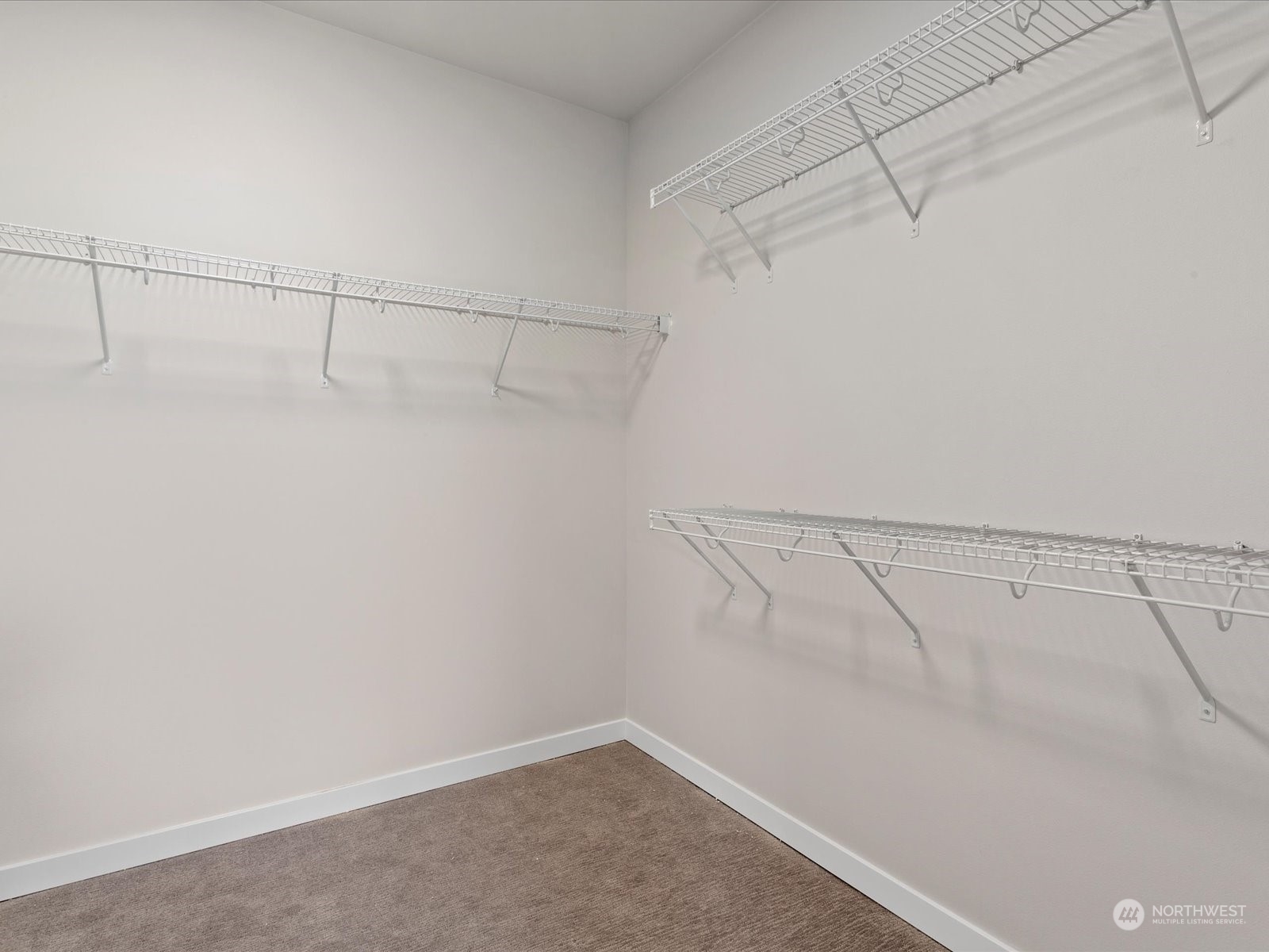 21609 1st Avenue West Bothell, WA 98021 - Photo 30 of 40 a view of a room with racks on the wall