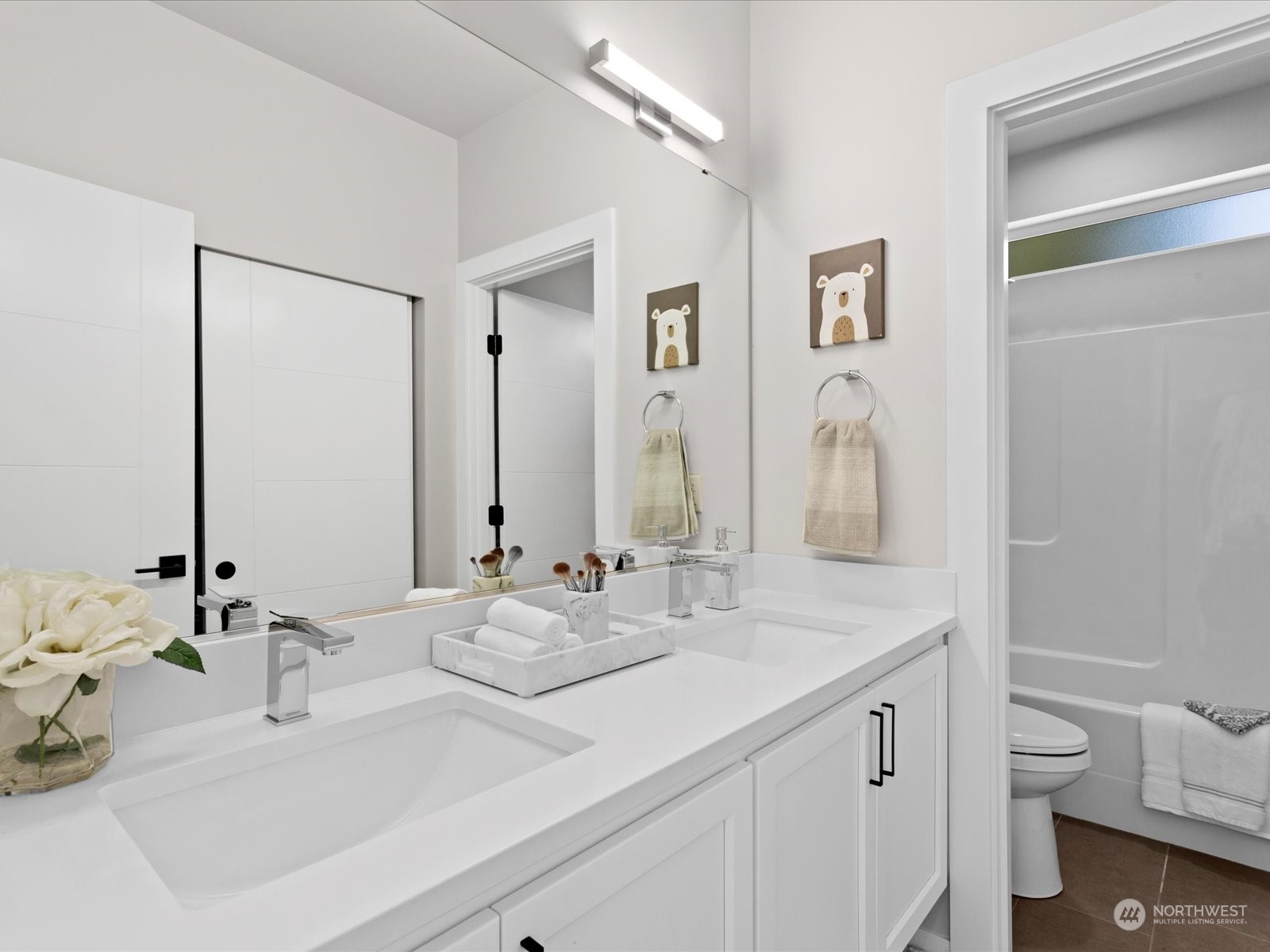 21609 1st Avenue West Bothell, WA 98021 - Photo 33 of 40 a bathroom with a double vanity sink mirror and toilet