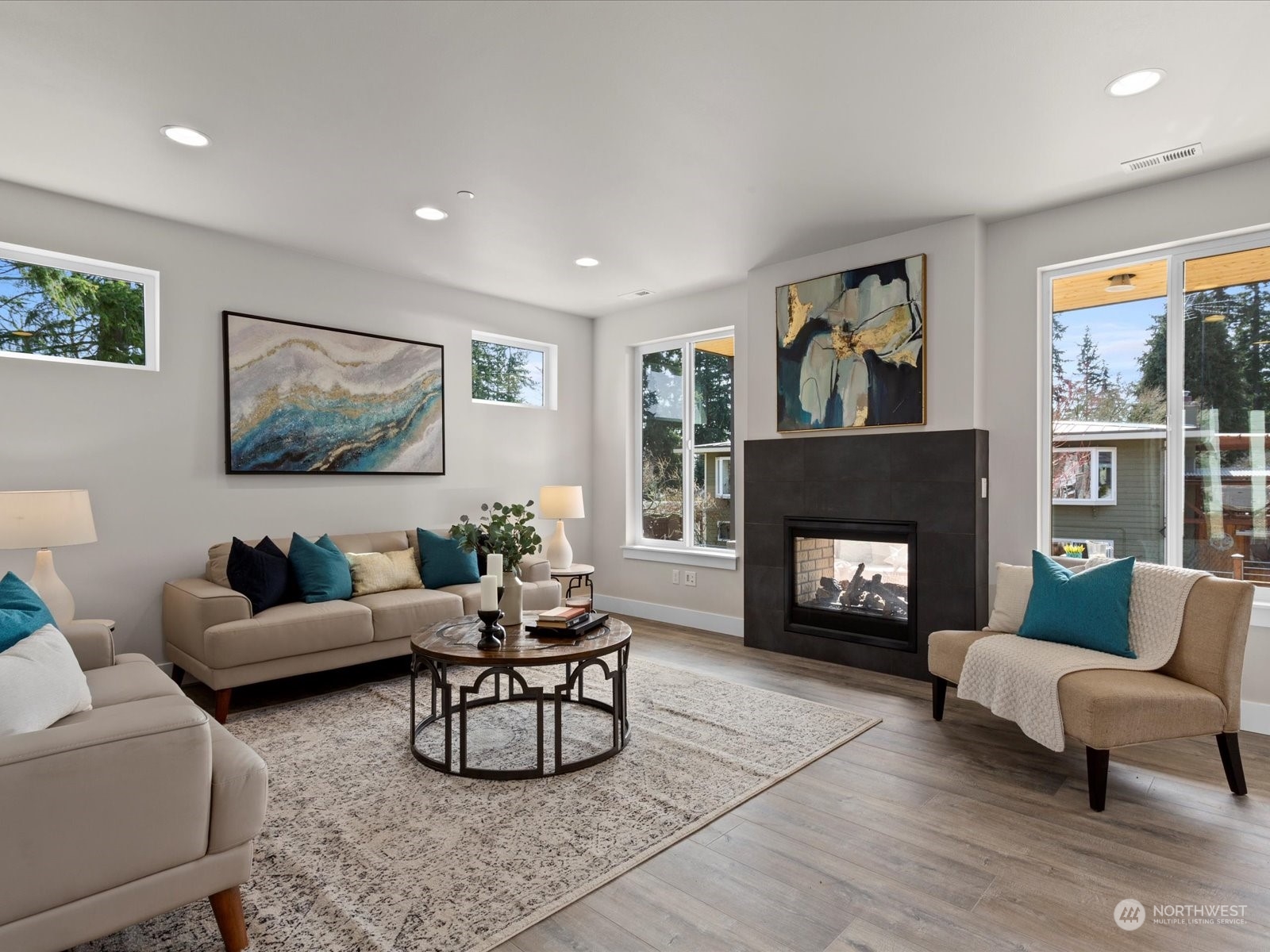 21609 1st Avenue West Bothell, WA 98021 - Photo 5 of 40 a living room with furniture and a fireplace