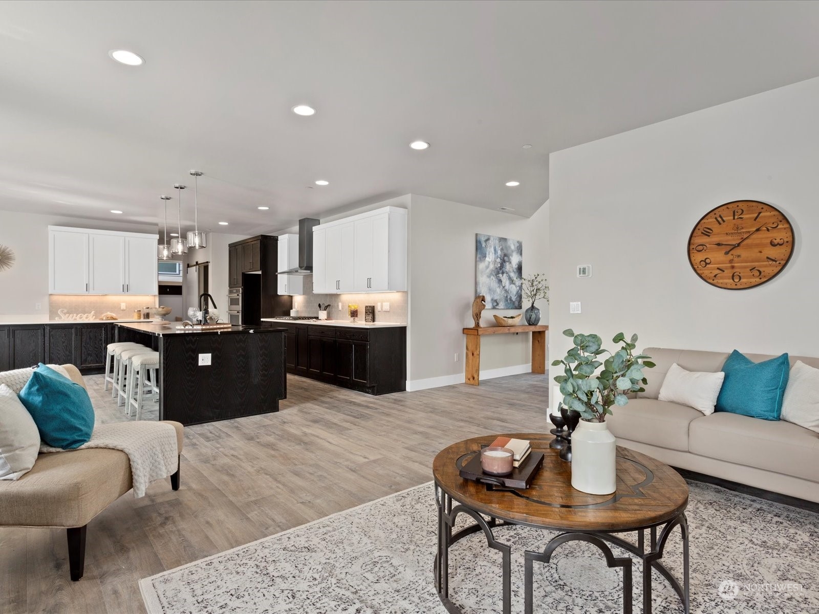 21609 1st Avenue West Bothell, WA 98021 - Photo 7 of 40 a living room with furniture kitchen view and a table