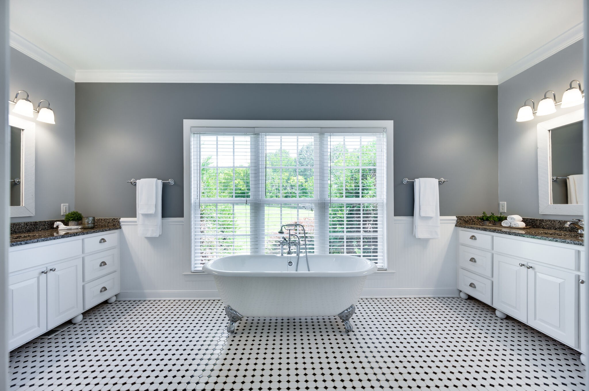 7676 Barnhill Road Primm Springs, TN 38476 - Photo 23 of 69 a room with a sink a mirror and a window