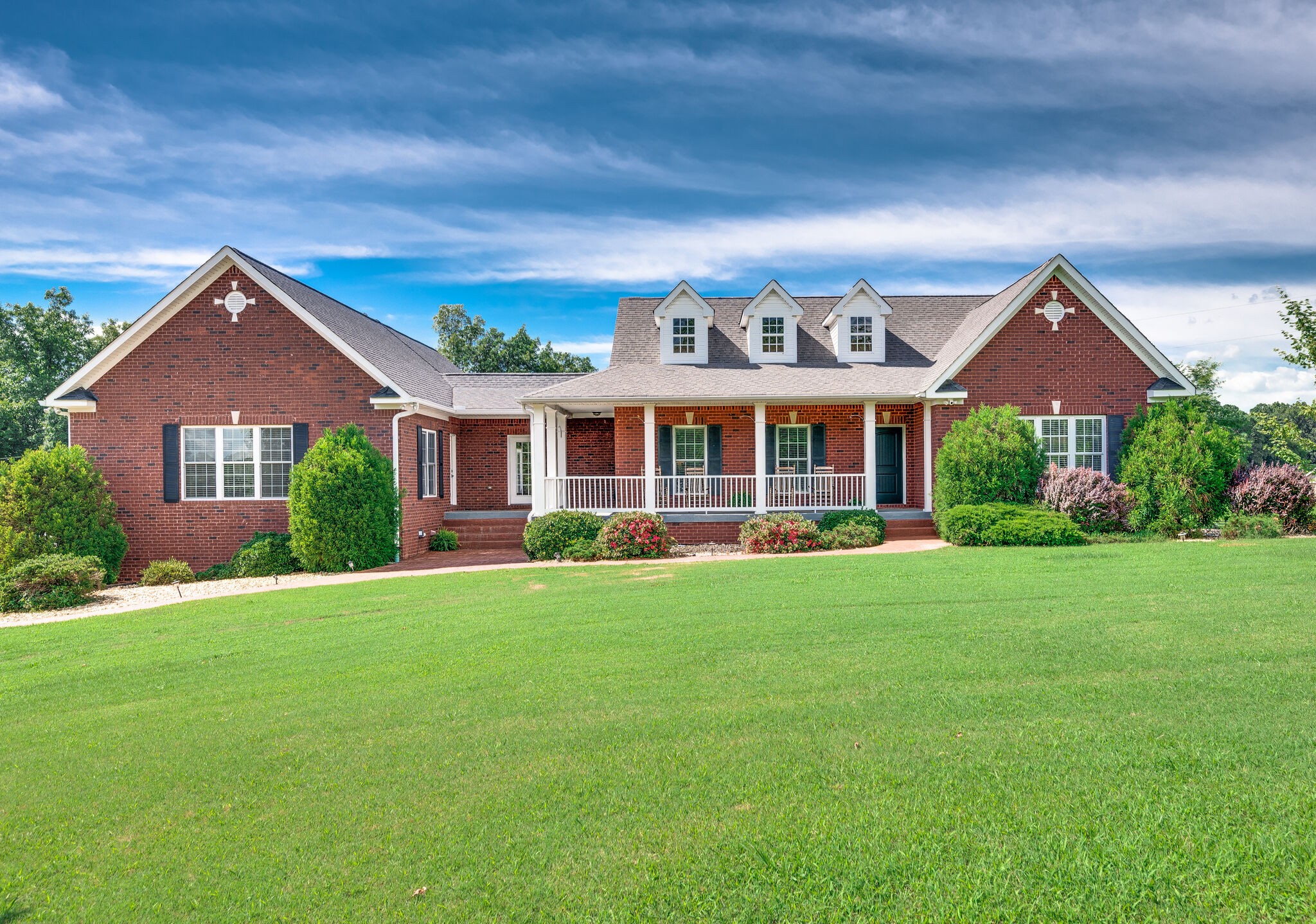 7676 Barnhill Road Primm Springs, TN 38476 - Photo 3 of 69 front view of a house with a yard