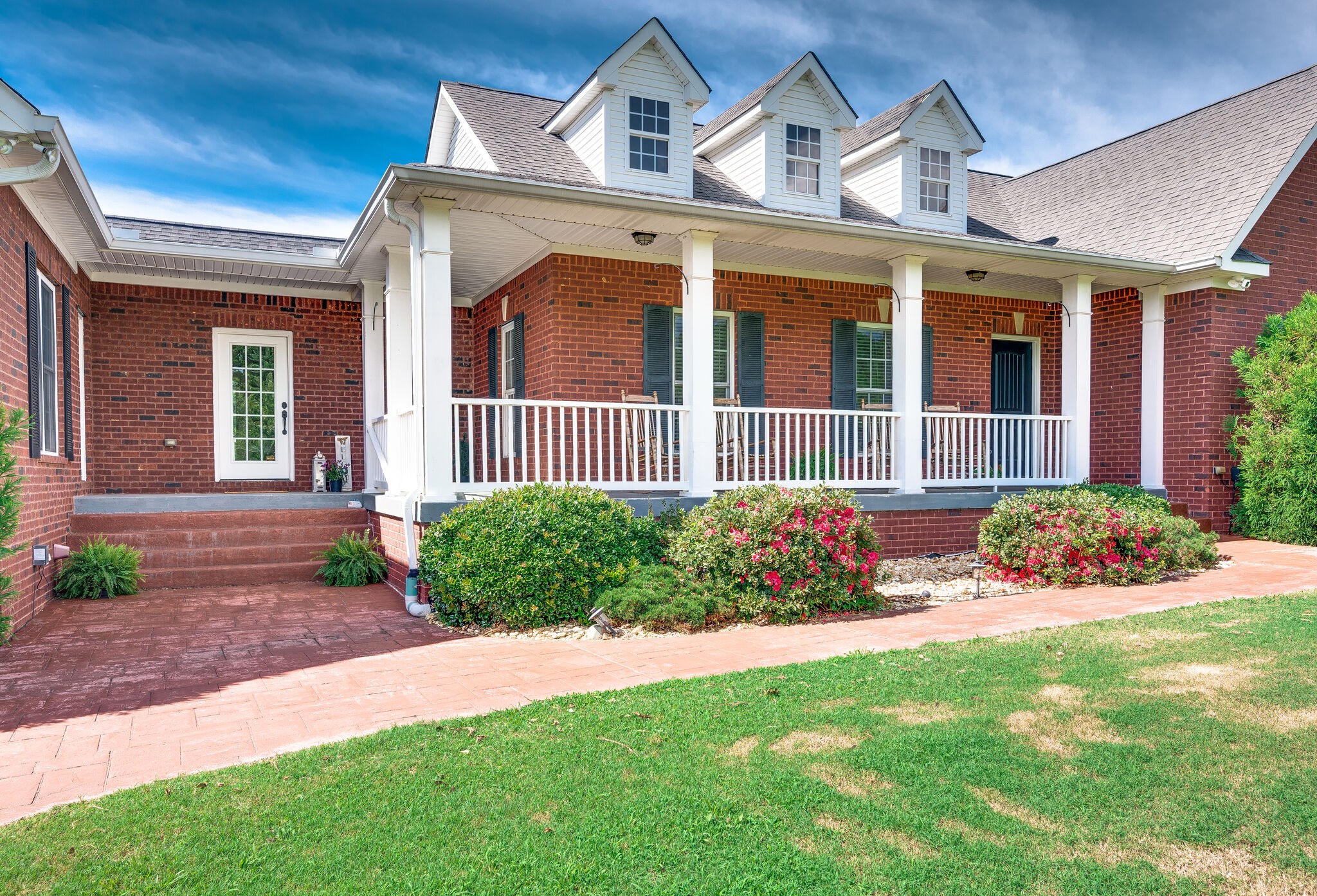 7676 Barnhill Road Primm Springs, TN 38476 - Photo 5 of 69 a front view of a house with a yard