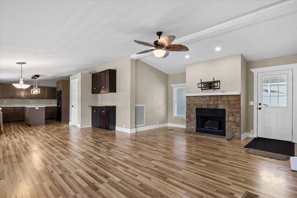 1112 Garners Creek Road Dickson, TN 37055 - Photo 6 of 57 a view of a livingroom with a fireplace a fireplace and wooden floor
