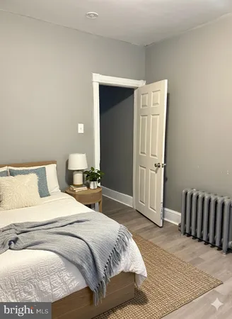 an empty room with wooden floor