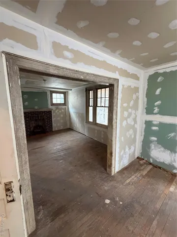 an empty room with windows