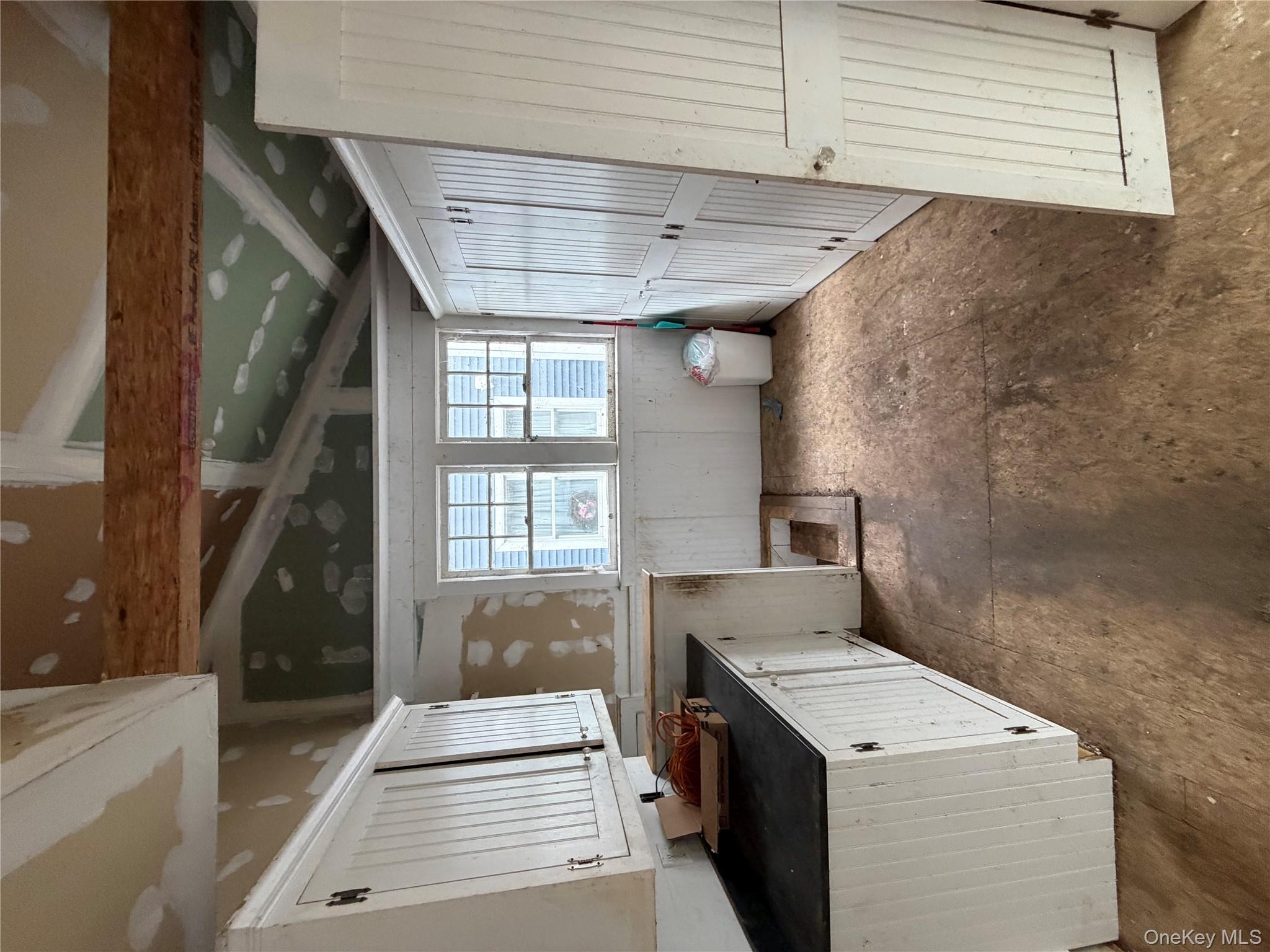 244 Tibbetts Road Yonkers, NY 10705 - Photo 19 of 28 a view of a kitchen with a sink and dishwasher