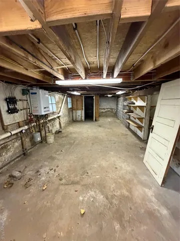 a view of a room with wooden walls