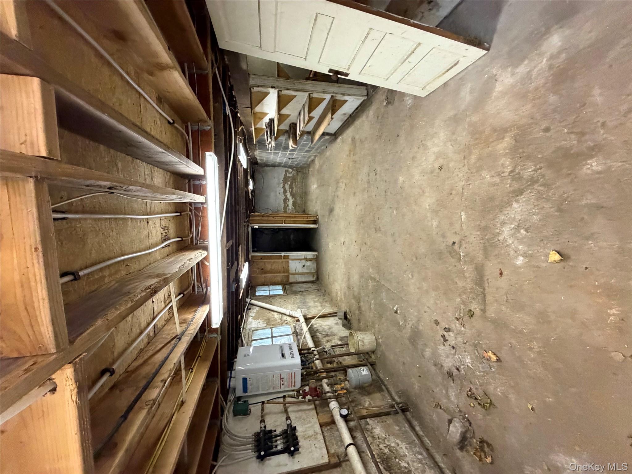 244 Tibbetts Road Yonkers, NY 10705 - Photo 22 of 28 a view of a room with wooden walls