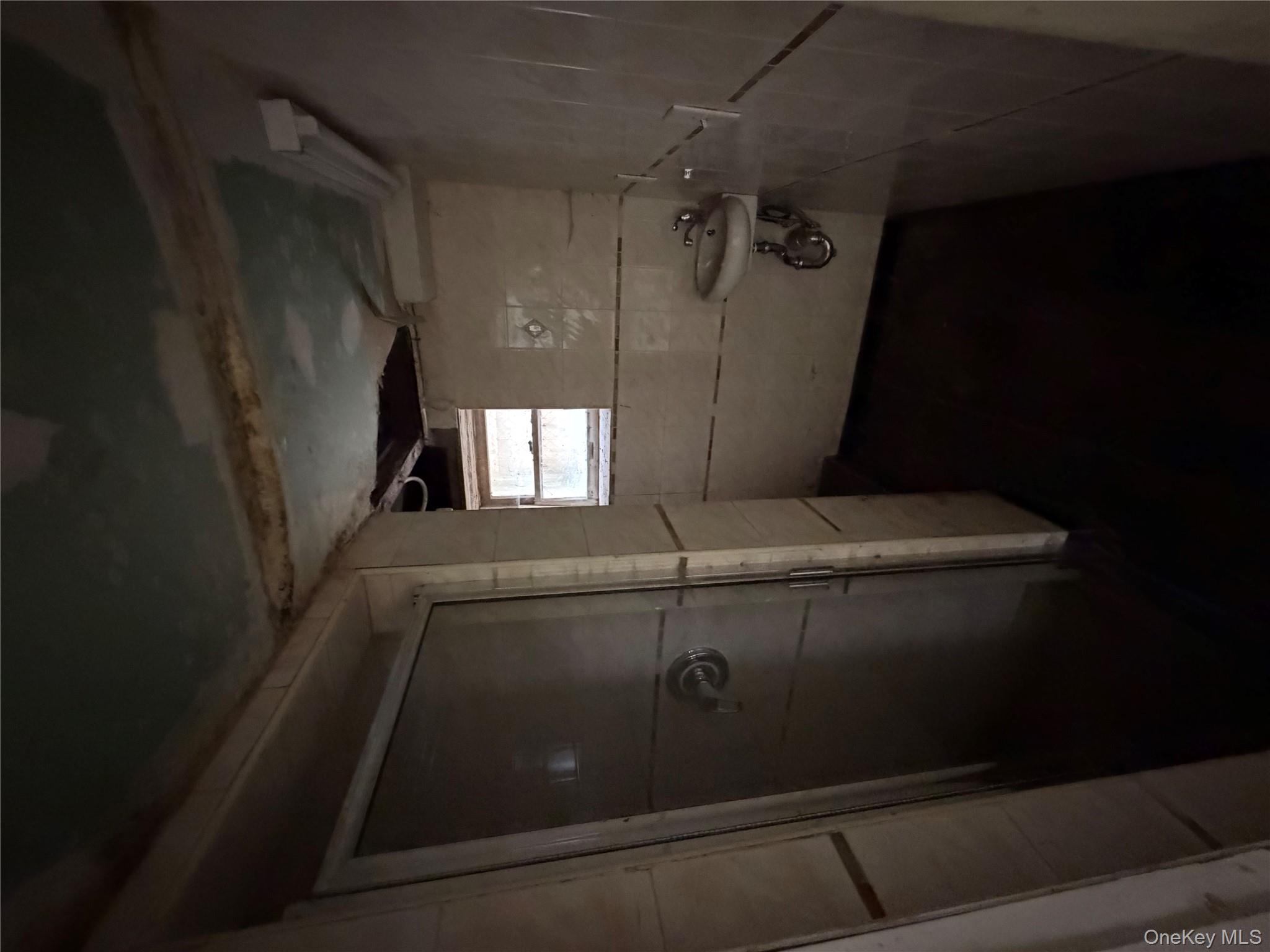 244 Tibbetts Road Yonkers, NY 10705 - Photo 26 of 28 a bathroom with a sink