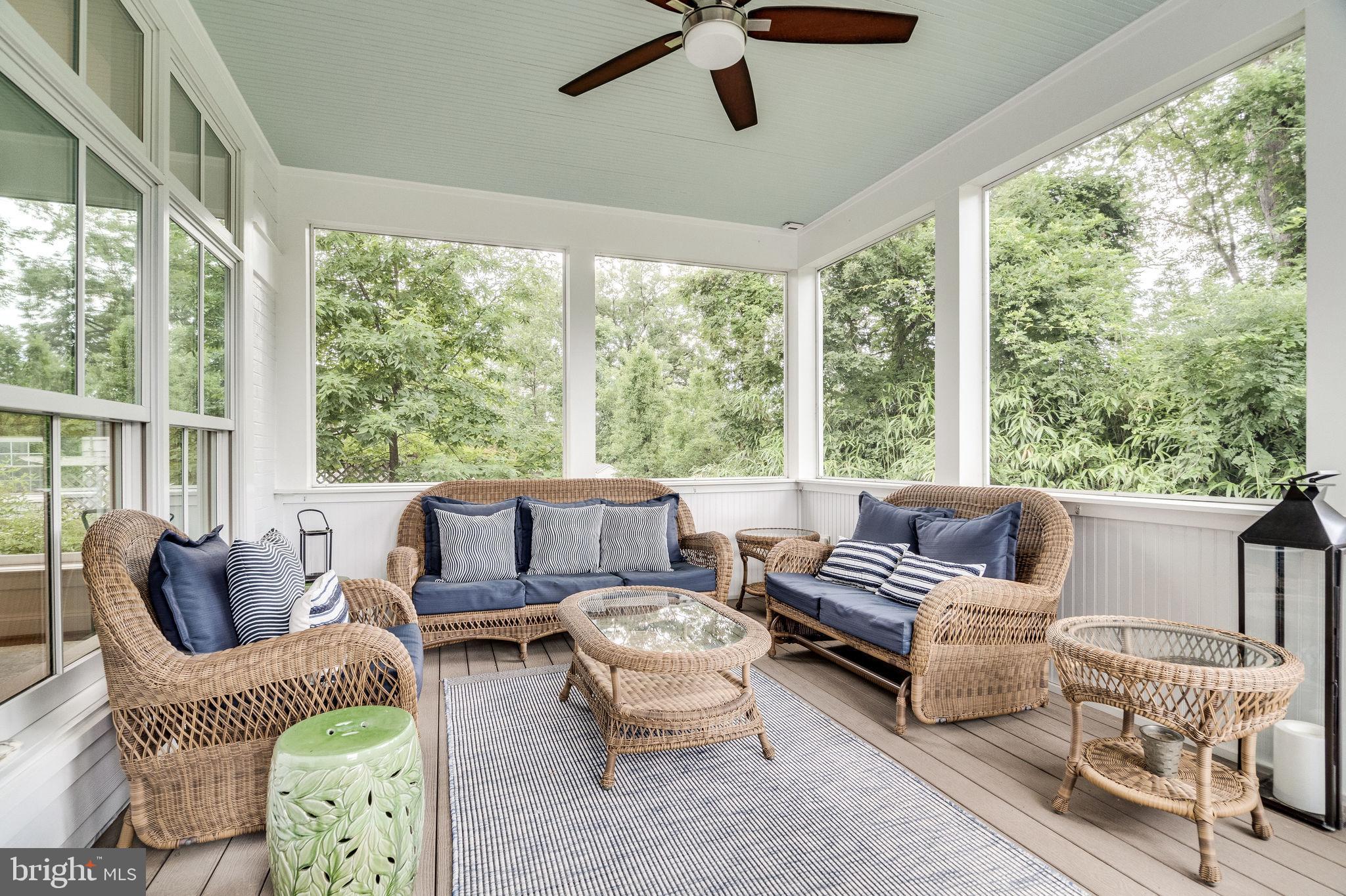 6221 Arkendale Road Alexandria, VA 22307 - Photo 21 of 60 a living room with furniture and floor to ceiling windows