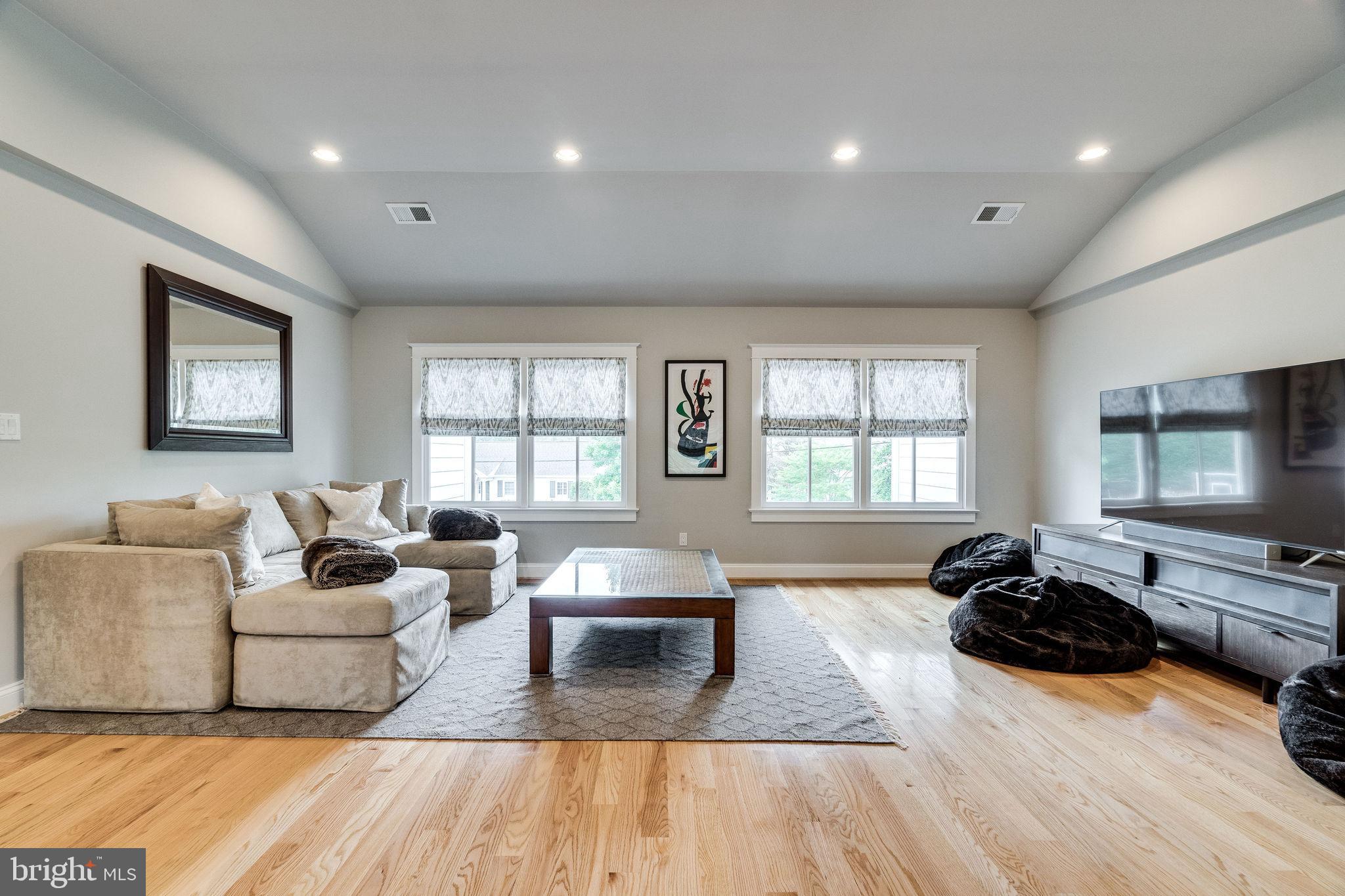 6221 Arkendale Road Alexandria, VA 22307 - Photo 41 of 60 a living room with furniture window and a wooden floor