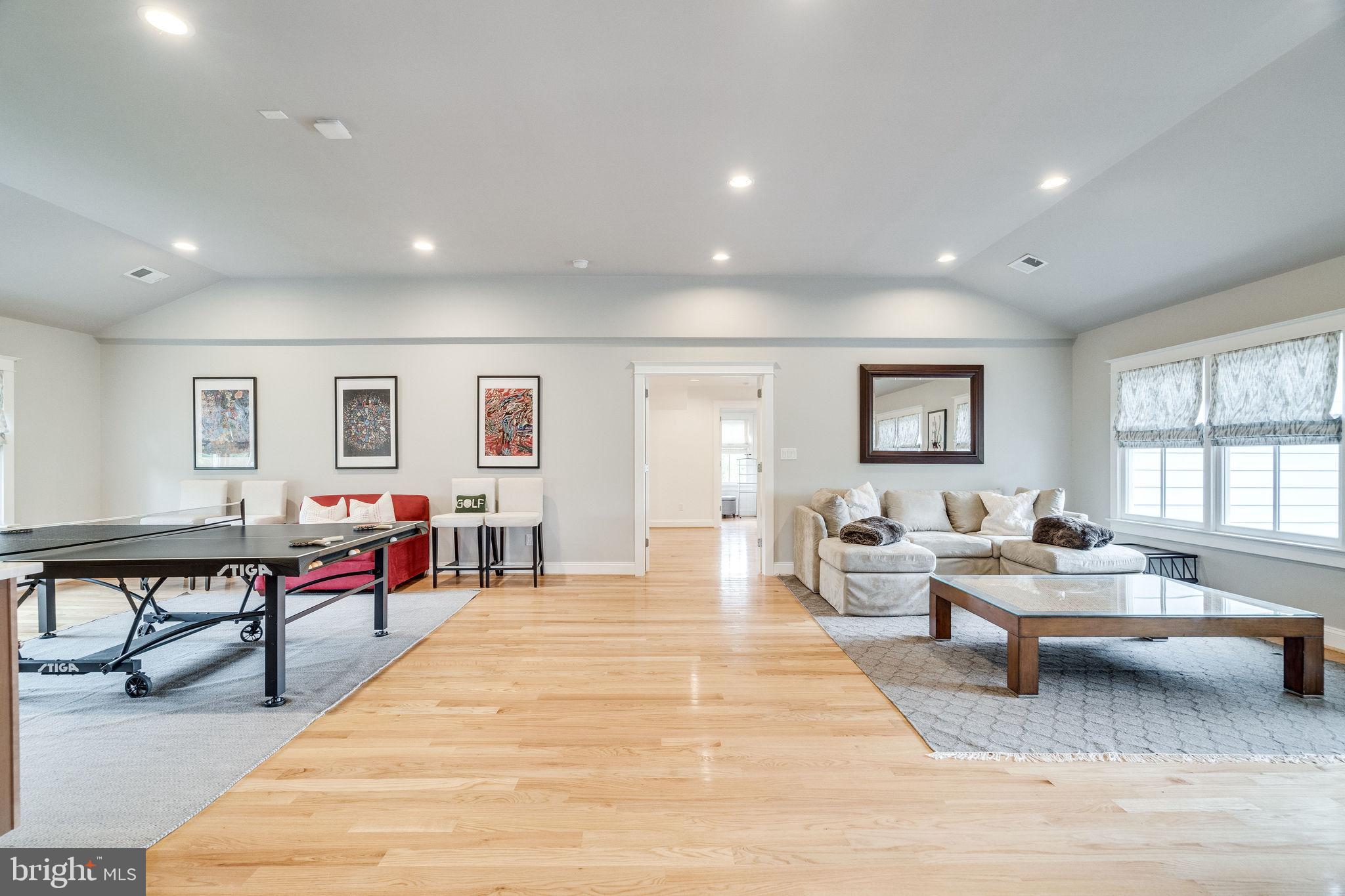 6221 Arkendale Road Alexandria, VA 22307 - Photo 42 of 60 a living room with furniture and a wooden floor