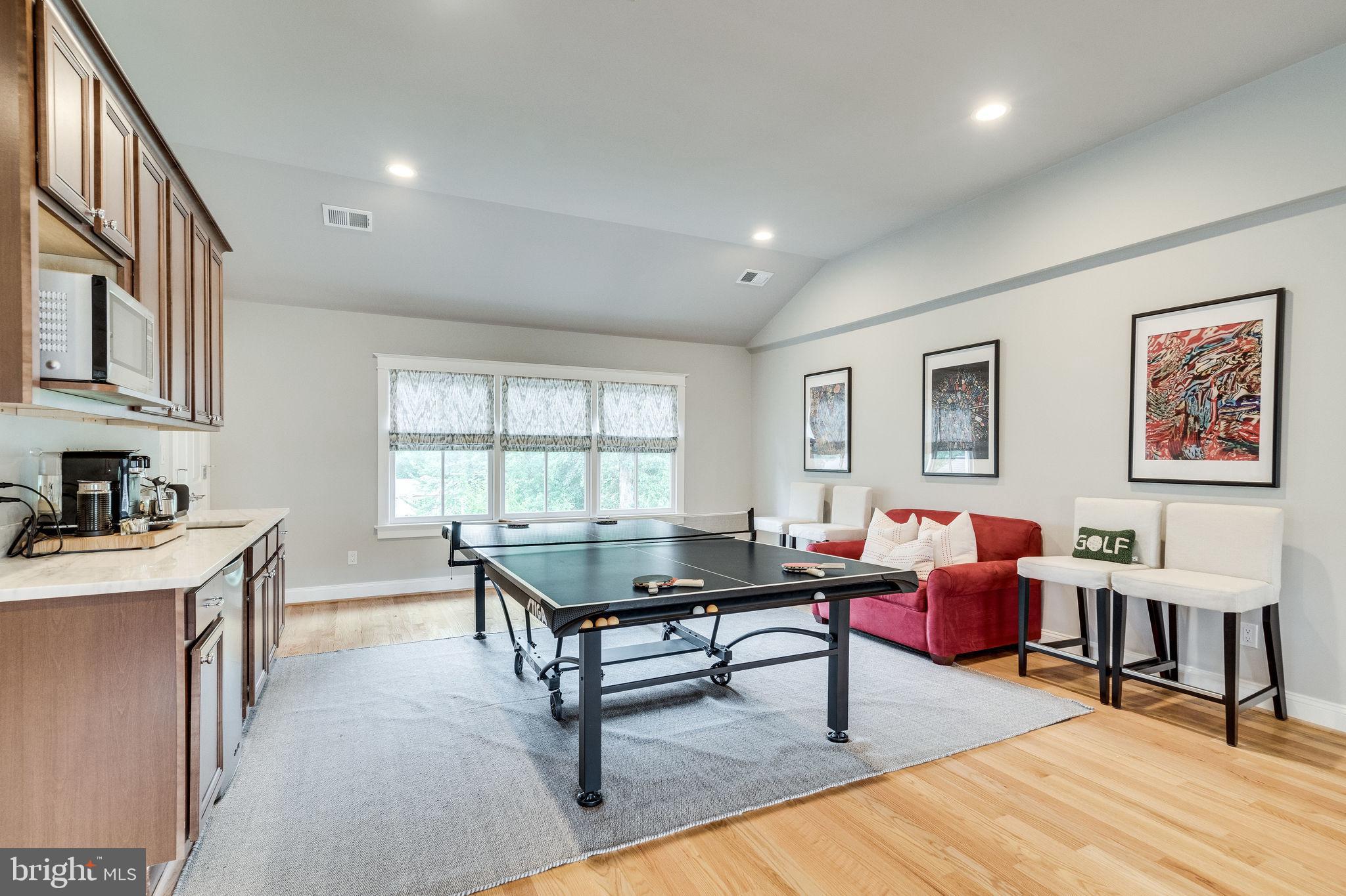 6221 Arkendale Road Alexandria, VA 22307 - Photo 45 of 60 a living room with furniture a rug and a window