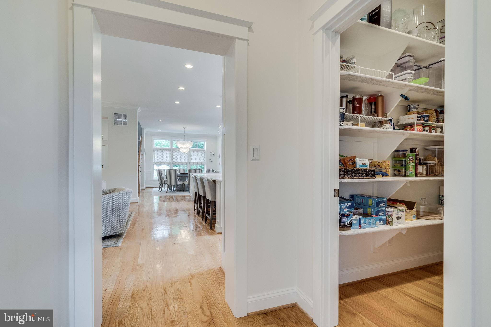 6221 Arkendale Road Alexandria, VA 22307 - Photo 52 of 60 a living room with furniture and a book shelf
