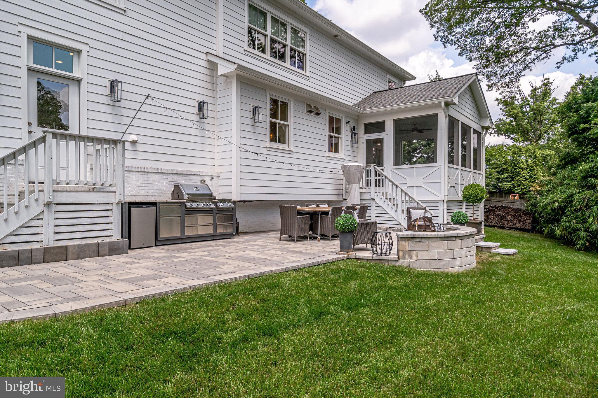 6221 Arkendale Road Alexandria, VA 22307 - Photo 55 of 60 a view of a house with a yard and sitting area