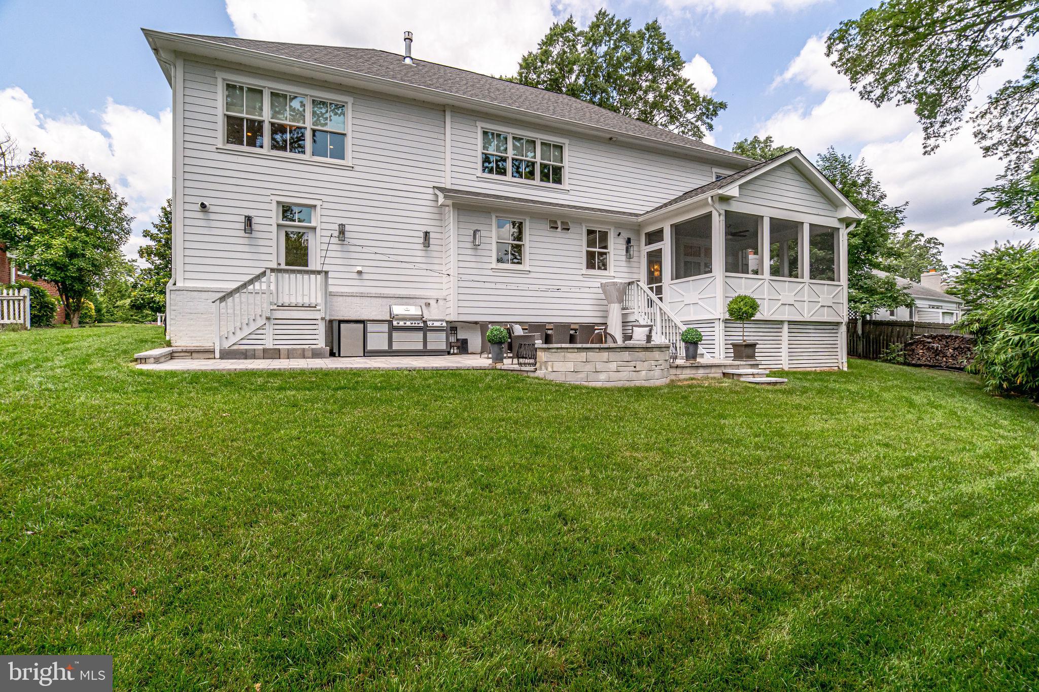6221 Arkendale Road Alexandria, VA 22307 - Photo 58 of 60 a front view of house with yard and outdoor seating