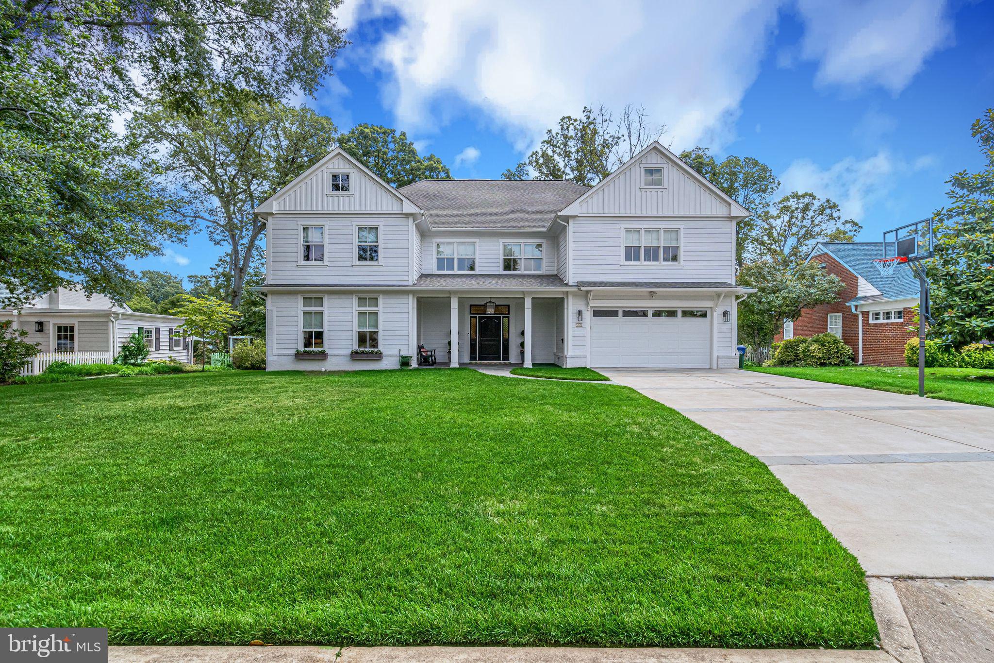 6221 Arkendale Road Alexandria, VA 22307 - Photo 59 of 60 a front view of a house with a yard