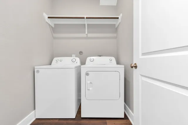 a utility room with dryer and washer